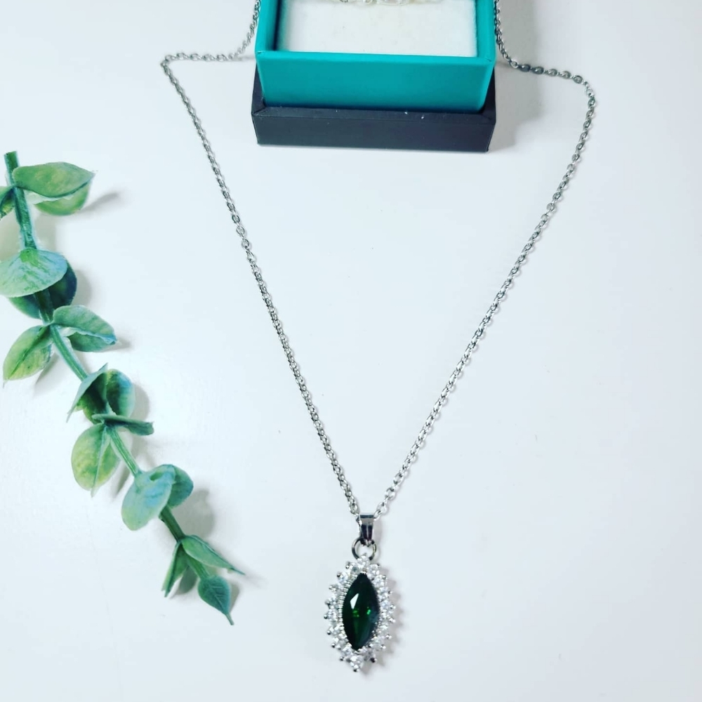 Green Zirconia pendant on a silver color chain